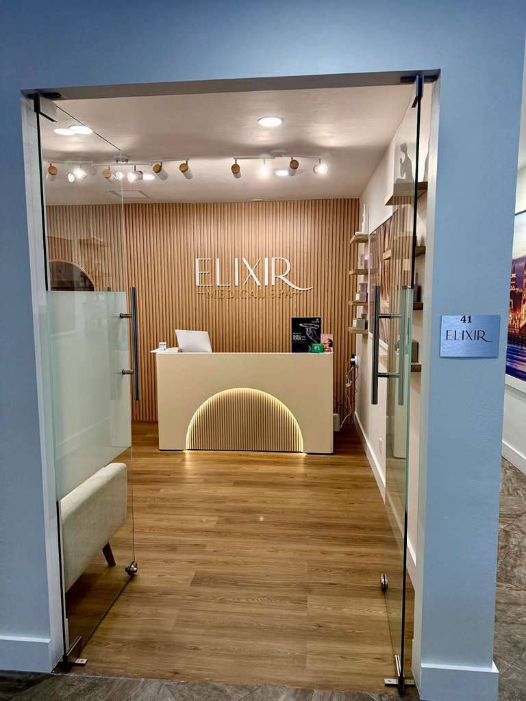 Client receiving treatment at Elixir Medical Spa Naples